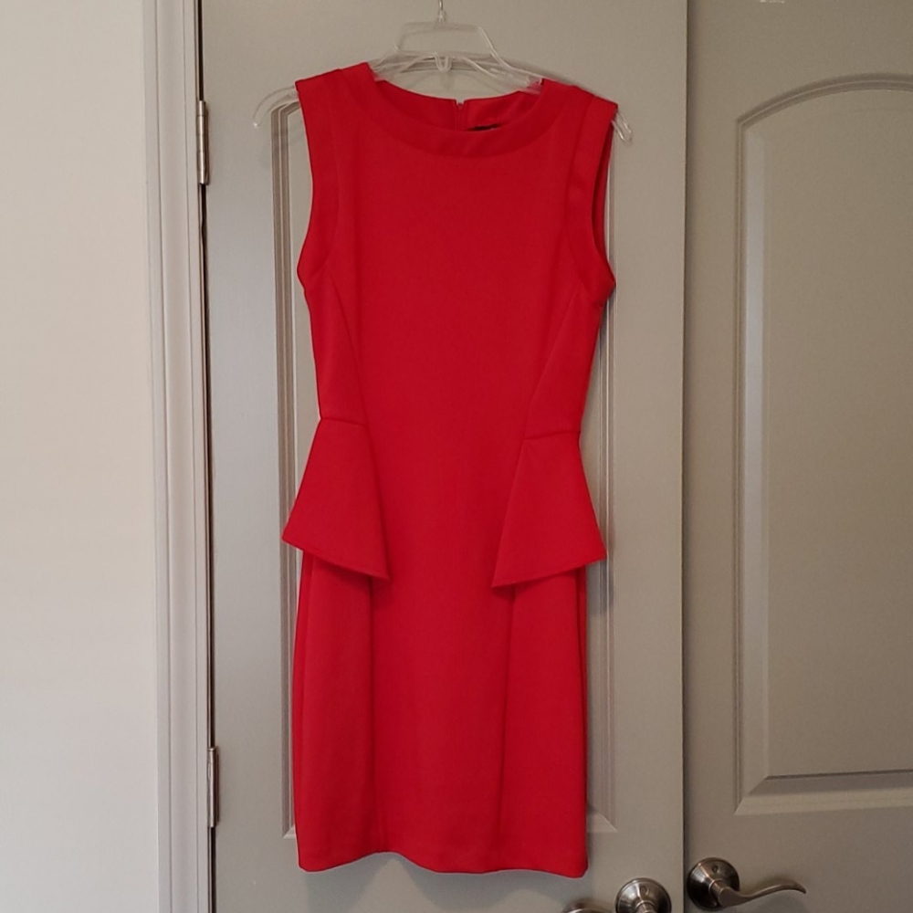B. Smart Peplum Cocktail Dress